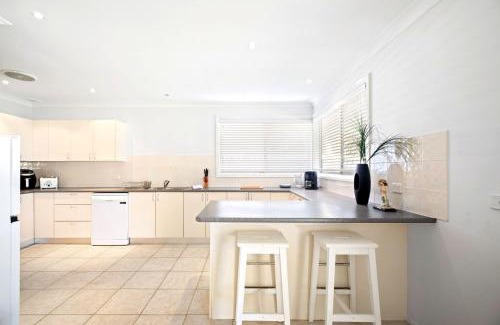 Budgewoi House | Serene Lakeview Retreat in Budgewoi for Families