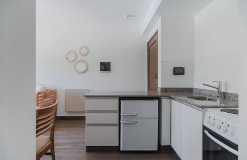 Cafayate Apartment | Experience Buena Vid: Poolside Relaxation & Spa Retreat