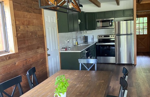 Alpine House | Buffalo Cabin: Alpine Retreat with Ocean View Amenities