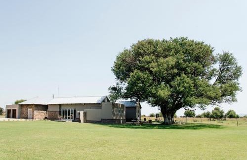 Kgetlengrivier Cabin | Cozy High Tree Lodge: Guest Rated 9/10 with Hot Tub & Fireplace