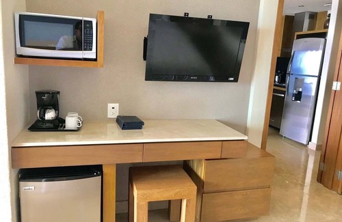 Olimpica Hotel | Inviting Buganvilias Resort Suite with Hot Tub & Family Fun