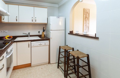 Molinell House | Discover Buganvilla: Oceanfront Apartment with Shared Pool
