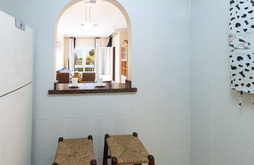 Molinell House | Discover Buganvilla: Oceanfront Apartment with Shared Pool