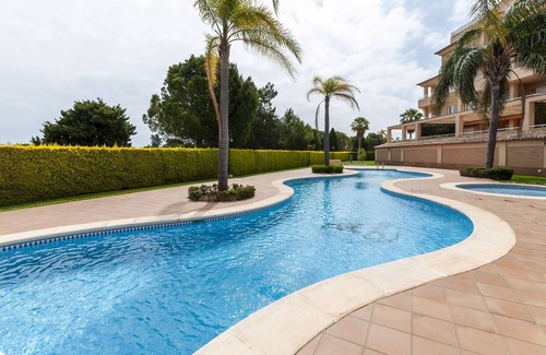 Molinell House | Discover Buganvilla: Oceanfront Apartment with Shared Pool