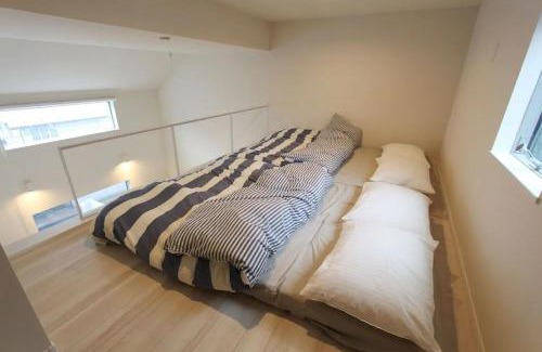 Higashi Apartment | Family-Friendly Retreat at Building A101 / Vacation STAY 1276