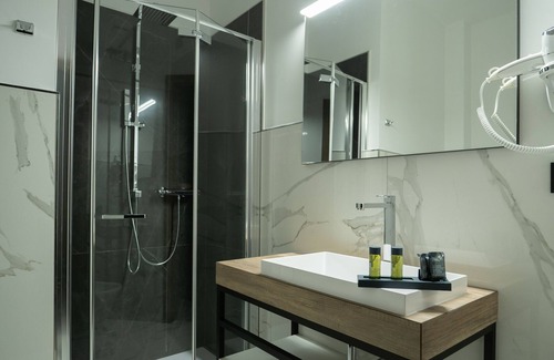 Carinaro Hotel | Discover Building Hotel: 4-Star Excellence & Eco-Friendly Amenities