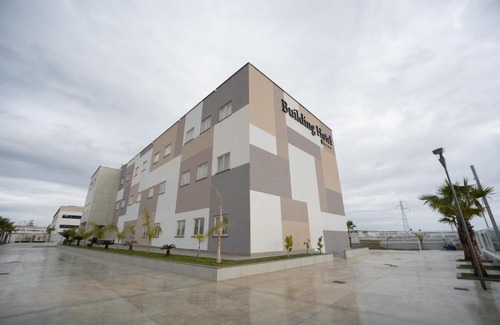 Carinaro Hotel | Discover Building Hotel: 4-Star Stay with Top Amenities