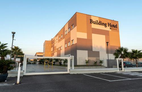 Carinaro Hotel | Discover Building Hotel: 4-Star Stay with Top Amenities