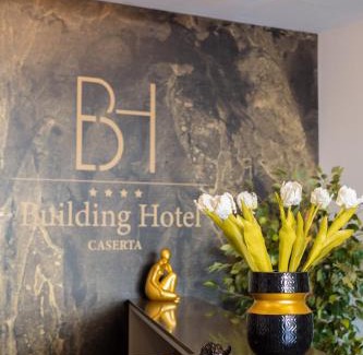 Carinaro Hotel | Discover Building Hotel: 4-Star Stay with Top Amenities