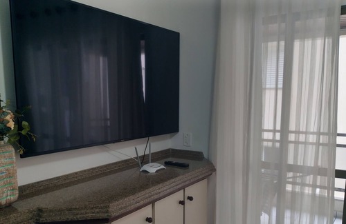 Itapema Apartment | Building in front of the sea, in the heart of half beach