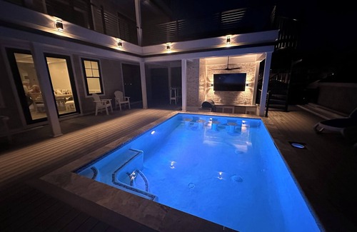 Fenwick Island House | Discover New Canal Front Hotel with Pool & Swim Up Bar