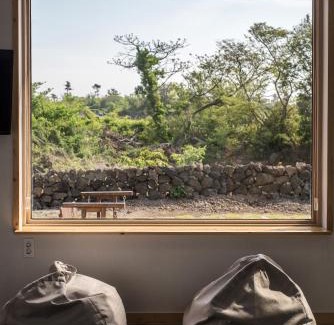 Hallim House | Eco-Friendly Retreat at Built in Garage Jeju with Hot Tub