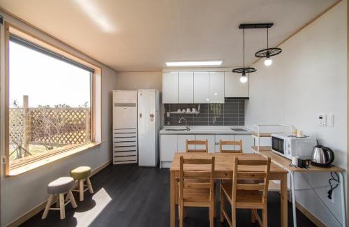 Hallim House | Eco-Friendly Retreat at Built in Garage Jeju with Hot Tub