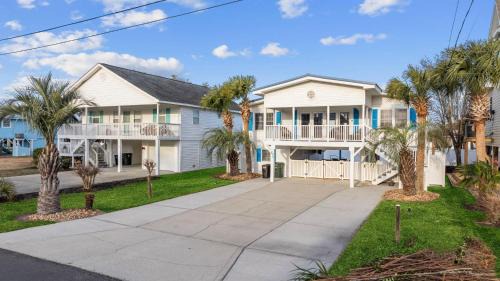 Cherry Grove Beach House | Relax at Bummer Busters: Family-Friendly with Pool & Hot Tub