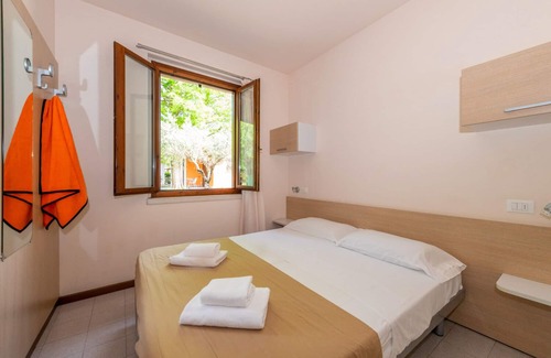 Colombare Resort | Cozy Bungalow Resort: One Bedroom Retreat for 4 Guests