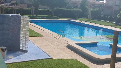 Puerto Marino Apartment | Bungalow en Novamar a 800 metros del mar