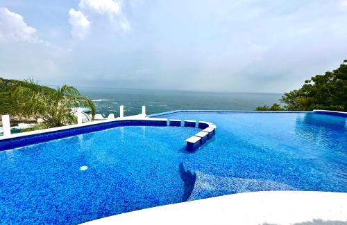 Puerto Angel Villa | Relax at Bungalow Ballenas y Delfines with Oceanfront Bliss