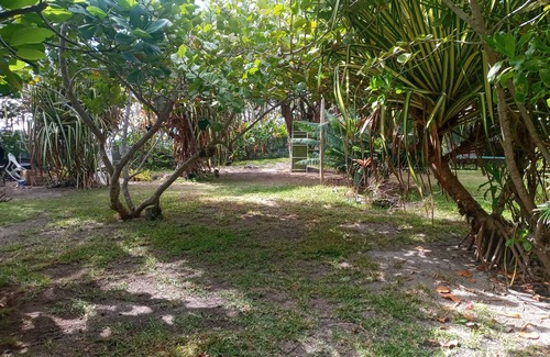 Temae House | Seafront Bungalow with Garden Access and Spa Amenities