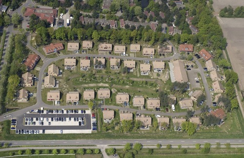 Municipality of Weert House | Charming Waterfront Bungalow with Rowing Boat & Pool