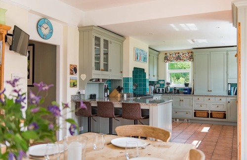 Charing House | Comfortable Burleigh House: Pool, Pet Friendly & Family Space