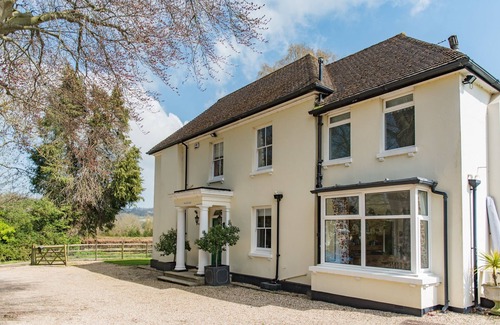 Charing House | Comfortable Burleigh House: Pool, Pet Friendly & Family Space