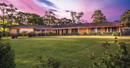 Lovedale House | Relax at Burncroft Guesthouse: Pool, Breakfast & More!
