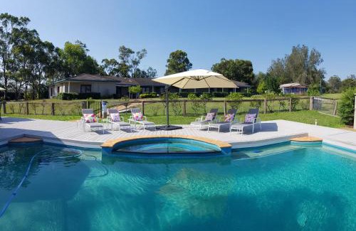 Lovedale House | Relax at Burncroft Guesthouse: Pool, Breakfast & More!