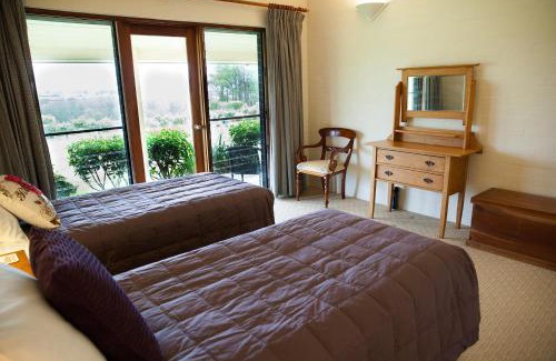 Lovedale House | Relax at Burncroft Guesthouse: Pool, Breakfast & More!