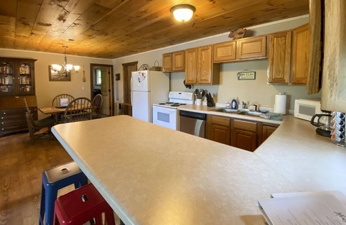 Hayward Cabin | Cozy Burns Lake Cabin with Dock, Fire Pit & Rowboat