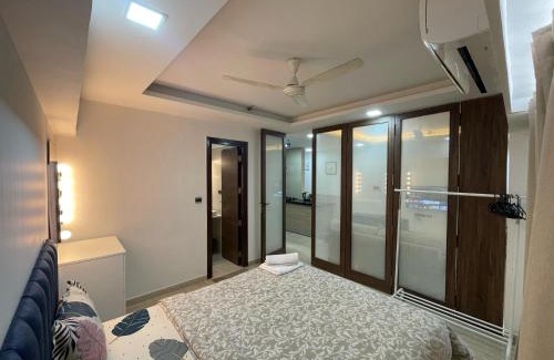 Kurla Apartment | Business-Ready Apt near Jio World Centre 1BR Gym Pool WiFi