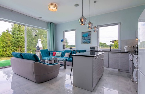 gmina Dobra House | Outstanding Butterfly Lux by Interhome: Pool & Lake View