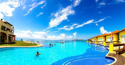 Tucuns Apartment | Experience Buzios Beach Resort: Oceanfront Luxury Awaits