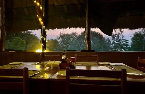 Pakwach Cabin | Enjoy Nature at Bwana Tembo Safari Camp with Pool & Breakfast