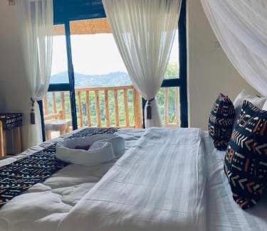 Bwindi Cabin | Discover Bwindi Neckview Lodge: Family-Friendly Retreat