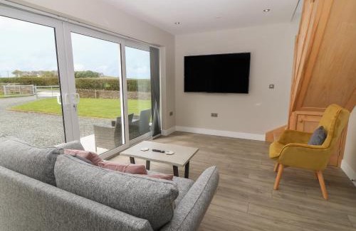 Rhosgoch House | Discover Bwthyn Cae'r Efail: 4-Star Guest Rated Excellence