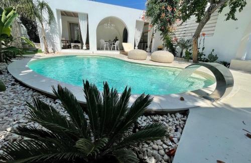 Skala Sotiros Villa | Elegant Byblos Aria: Oceanfront Villa with Pool & Dining