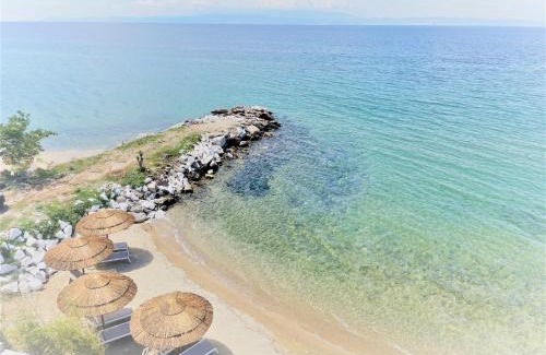 Skala Sotiros Villa | Elegant Byblos Aria: Oceanfront Villa with Pool & Dining
