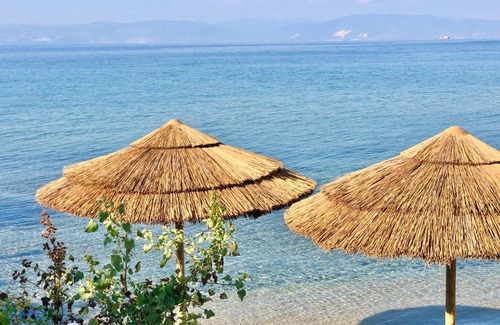 Skala Sotiros Villa | Elegant Byblos Aria: Oceanfront Villa with Pool & Dining