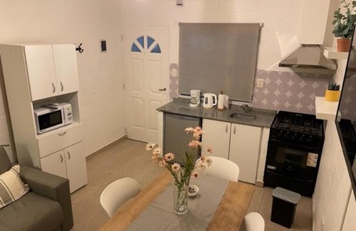 Comodoro Rivadavia Apartment | Cozy Retreat in Comodoro Rivadavia with Restaurant & Breakfast