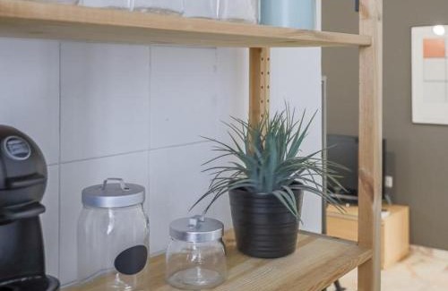 San Roque Apartment | Relax at Caños de Carmona: Cozy Stay with Dining Options