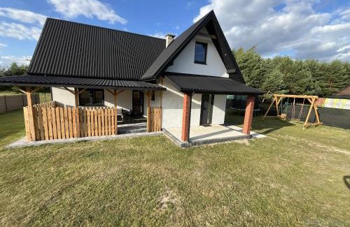 gmina Urszulin Villa | Family-Friendly Retreat at Całoroczny dom wypoczynkowy pod Lasem
