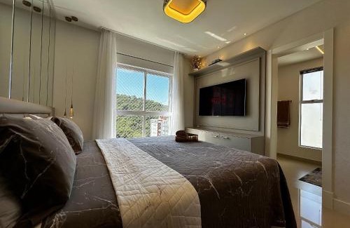 Pioneiros Apartment | Elegant 4-Suite Retreat with Garage & Family-Friendly Perks