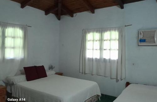 Colonia Carlos Pellegrini Apartment | Discover Cabaña Iberá: Poolside Retreat for Families
