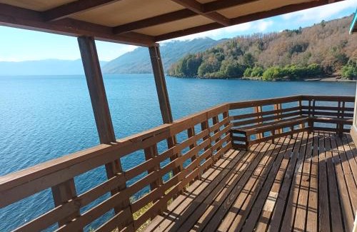 Caburgua Apartment | Cabaña Celeste - Acceso directo a playa lago Caburgua y cancha de tenis - direct access Beach in Caburgua Lake and tenis court