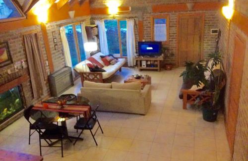 San Martin de los Andes House | Idyllic Cabaña by the Stream with Hot Tub & Pet Friendly