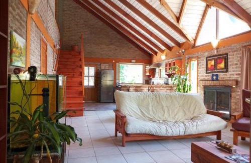 San Martin de los Andes House | Idyllic Cabaña by the Stream with Hot Tub & Pet Friendly