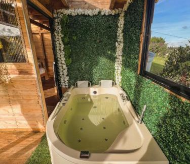 Guarne House | Relax in a Cozy Cabaña with Jacuzzi and BBQ Zone