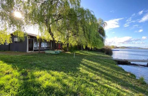 Quillon House | Inviting Cabaña with Dock by the Lagoon and Ocean View