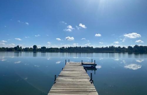 Quillon House | Inviting Cabaña with Dock by the Lagoon and Ocean View
