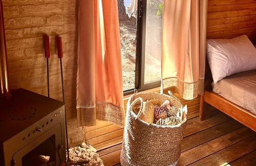 Oceania del Polonio Cabin | Discover Cabaña de la Tierra in Oceania's Enchanting Woods